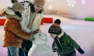 Mother & Childre Building Snowman